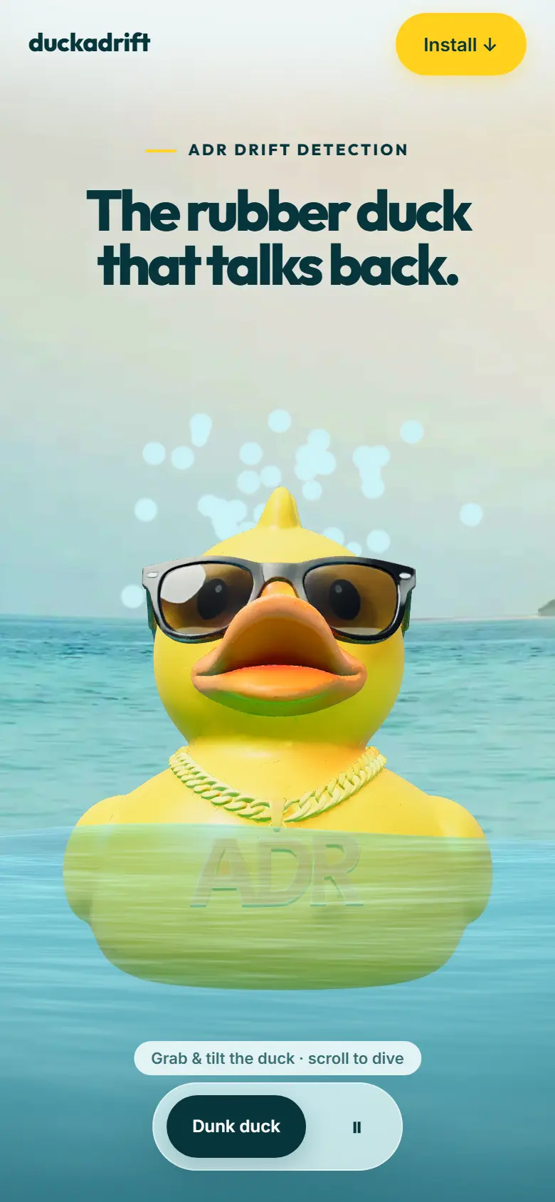 The Duckadrift landing page, with the water scene and the duck, on a phone.